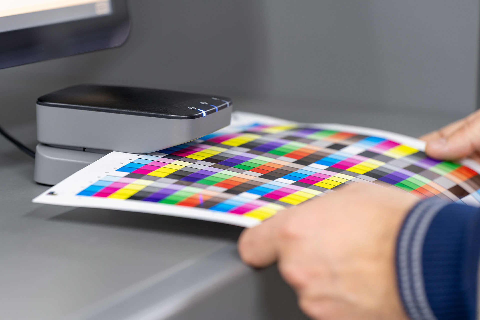 Set-up-digital-printing-press-for-production.-Paper-measuring-and-color-calibration.